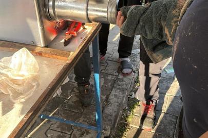 Elini kıyma makinesine kaptıran esnaf yaralandı