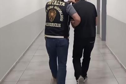 Antalya'da dolandırıcılık şüphelisi bankada para çekerken yakalandı