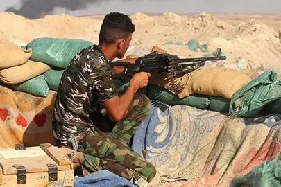 Irak'ta bir Şii milis grup daha silah envanterini hükümete teslim etti
